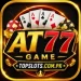 AT77 Game premium casino-style logo with gold design, playing cards, chips, and TOPSLOTS.COM.PK branding.